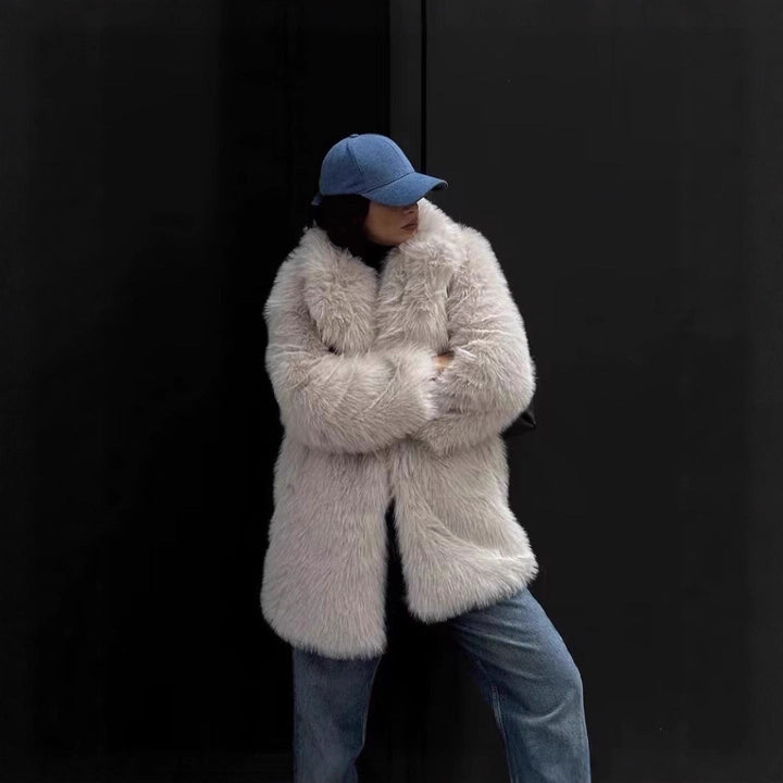 Stylish off-white women's winter jacket. Elegant outerwear featuring a chic design for a sophisticated and warm fashion statement.