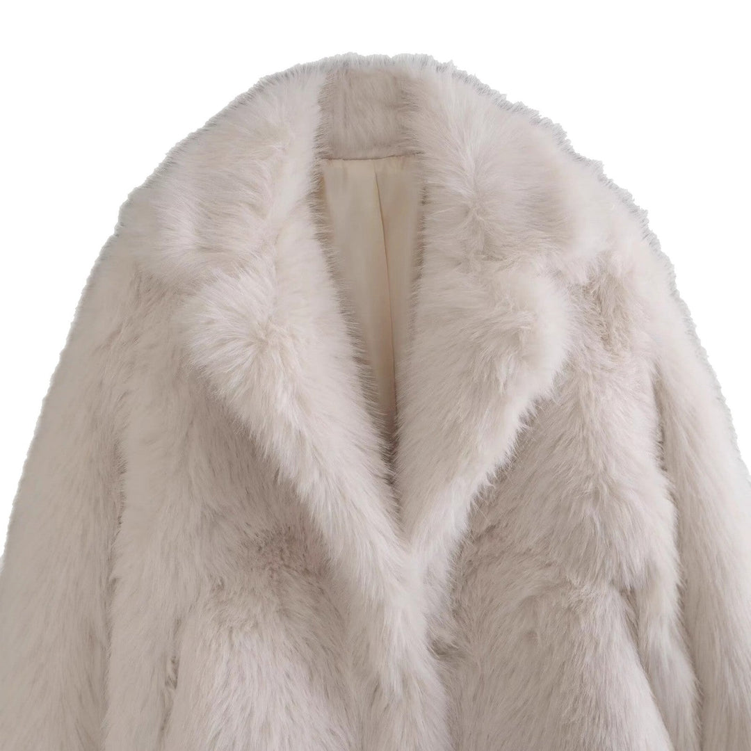 Off-white women's elegant winter jacket. Warm and chic outerwear for sophisticated style, ensuring cozy comfort.