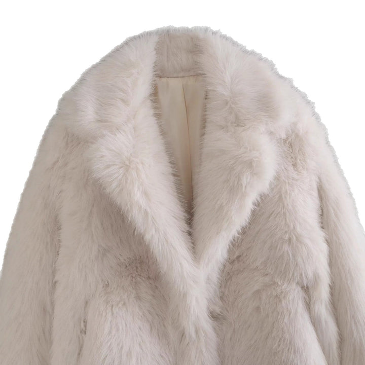 Off-white women's elegant winter jacket. Warm and chic outerwear for sophisticated style, ensuring cozy comfort.