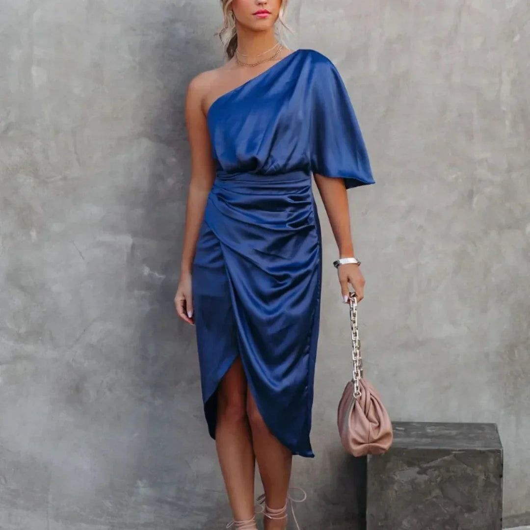 Stylish women's mini wrap dress with an asymmetrical hem and one shoulder design, ideal for evening wear.