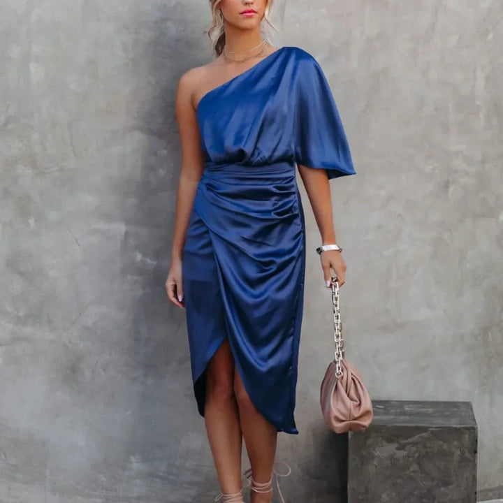 Stylish women's mini wrap dress with an asymmetrical hem and one shoulder design, ideal for evening wear.