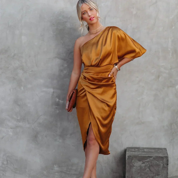 Fashionable elegant mini dress for women with unique one shoulder and asymmetrical wrap design.