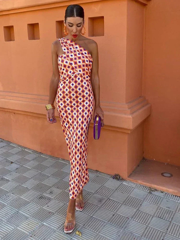 Elegant women's one-shoulder flowy maxi dress in light blue, perfect for summer parties or vacation.