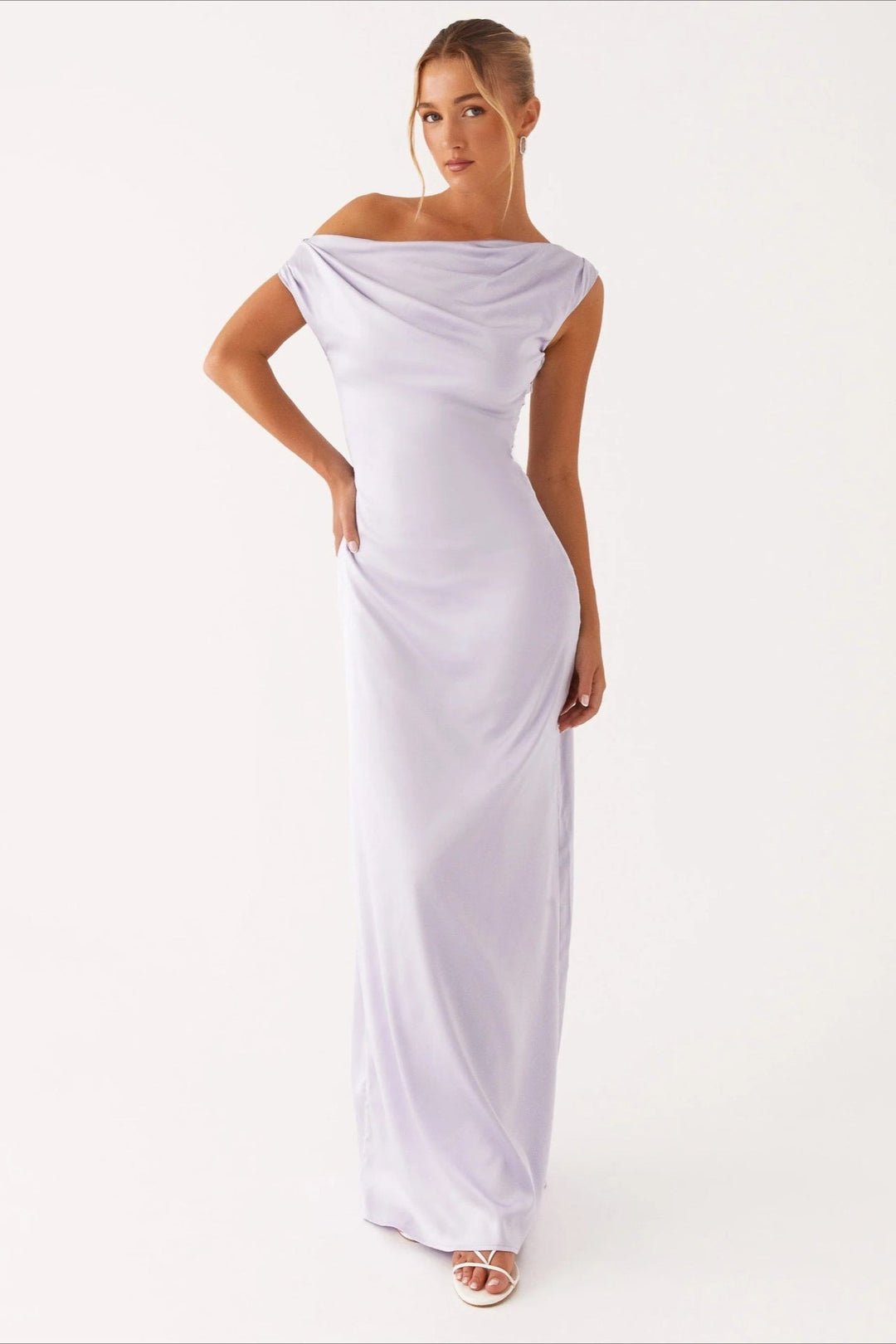 Women's special occasion dress, one-shoulder, high-waist, and asymmetric maxi style for elegance.