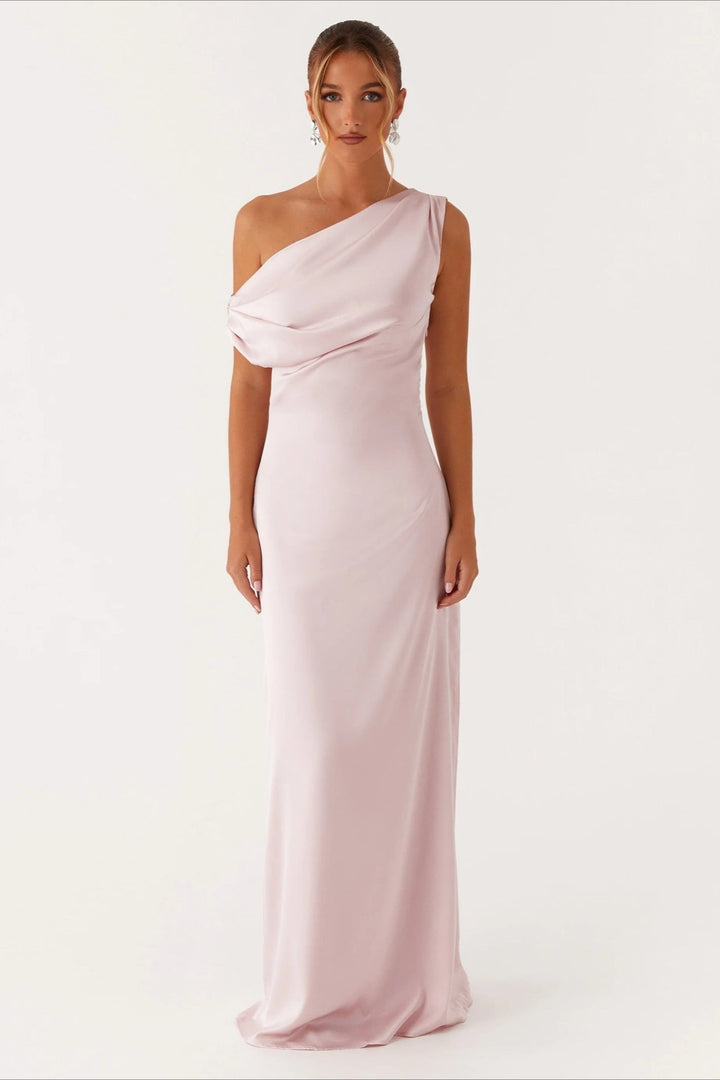 Elegant women's one-shoulder party dress, high-waist, and asymmetric maxi length for a stunning look.