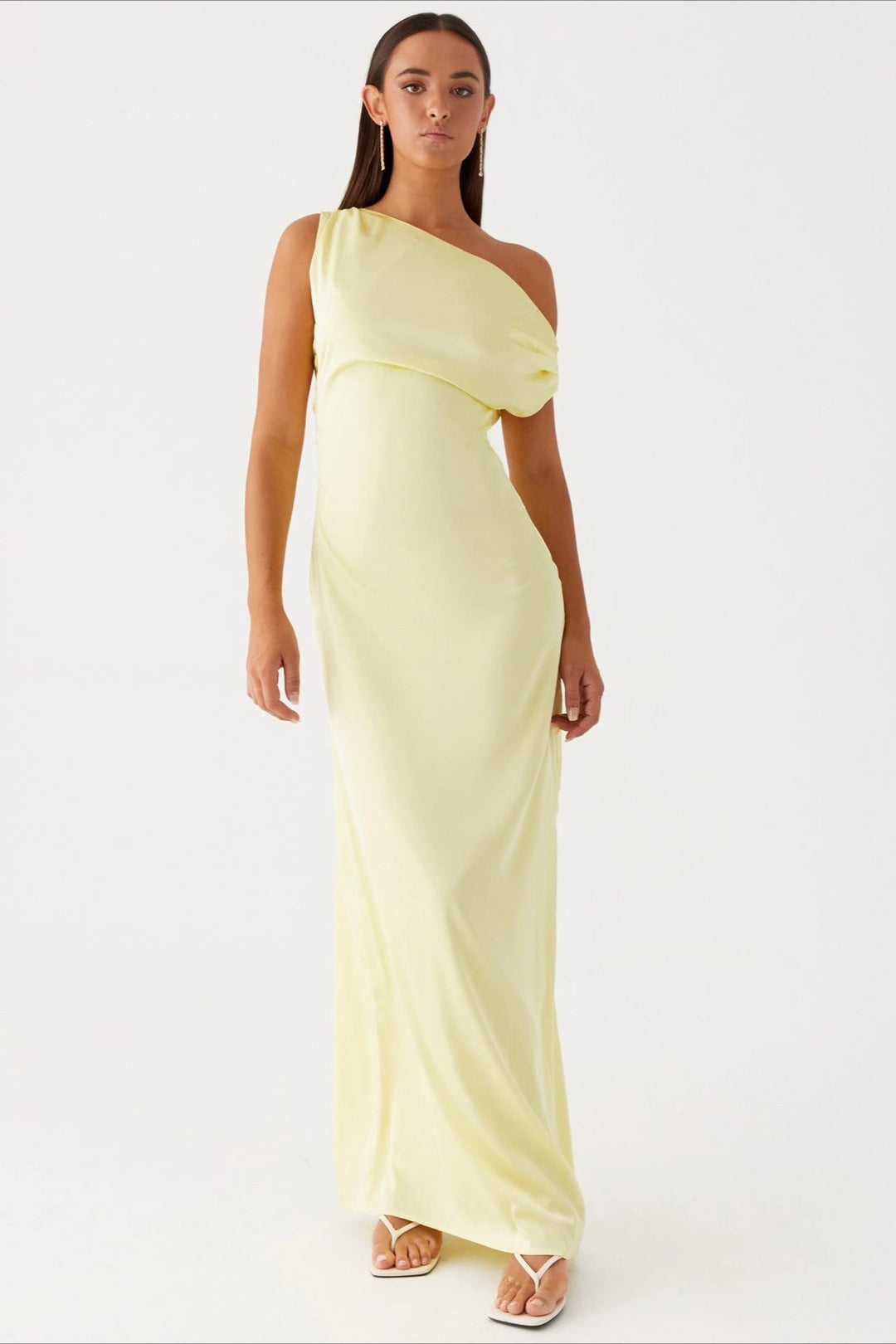 Stunning women's one-shoulder party dress, featuring a high-waist and modern asymmetric maxi hem.