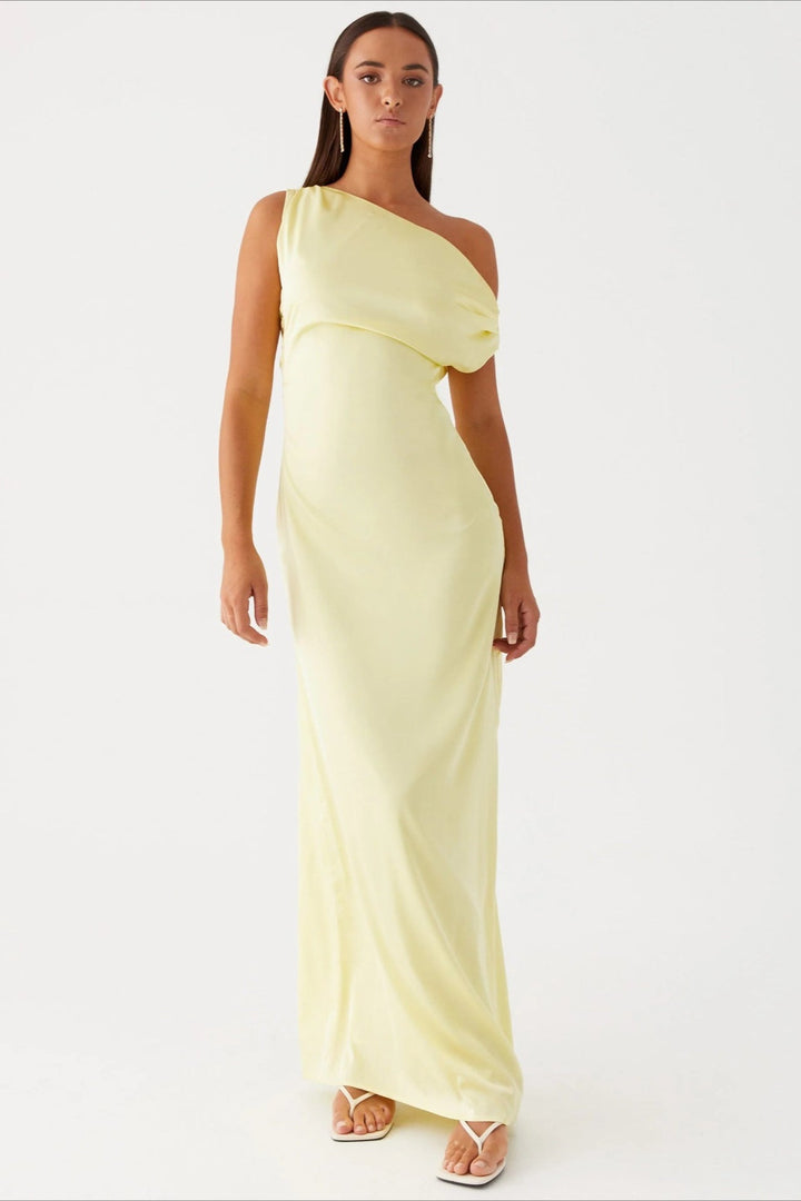 Stunning women's one-shoulder party dress, featuring a high-waist and modern asymmetric maxi hem.