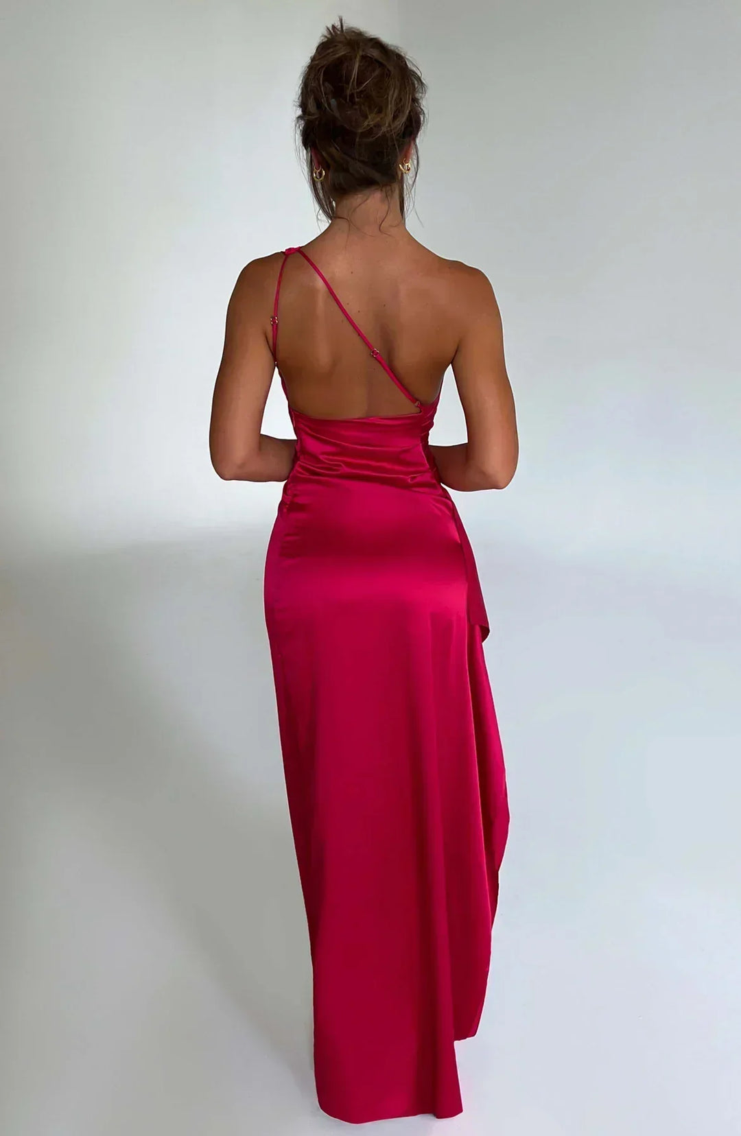 Flowing asymmetric one-shoulder maxi dress for women, ideal for spring and summer formal occasions.