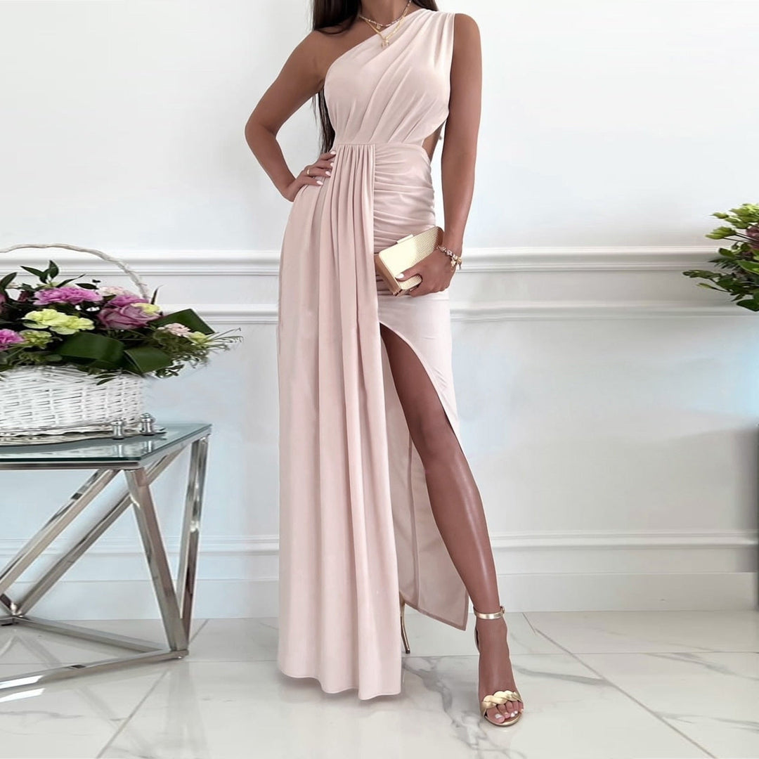 Blush pink women's one shoulder maxi evening gown, featuring a draped waist and leg split. Ideal for formal events.