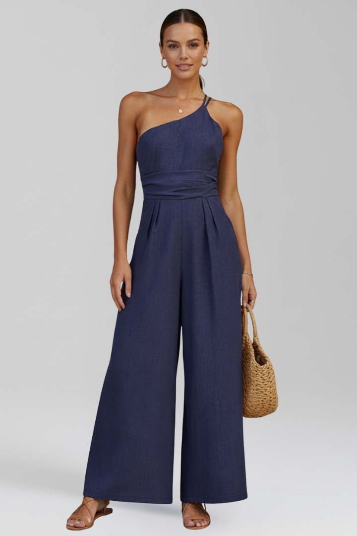 Close-up of the elegant one-shoulder detail on a women's wide-leg jumpsuit for summer.