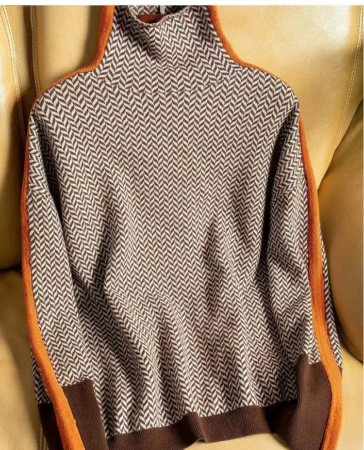 Elegant women's orange herringbone turtleneck sweater, perfect for cozy winter fashion, long sleeve knitwear