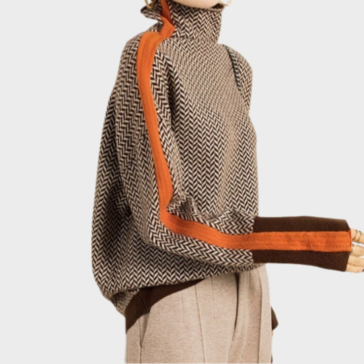 Women's luxurious orange herringbone turtleneck sweater, cozy and stylish, ideal for winter outfits