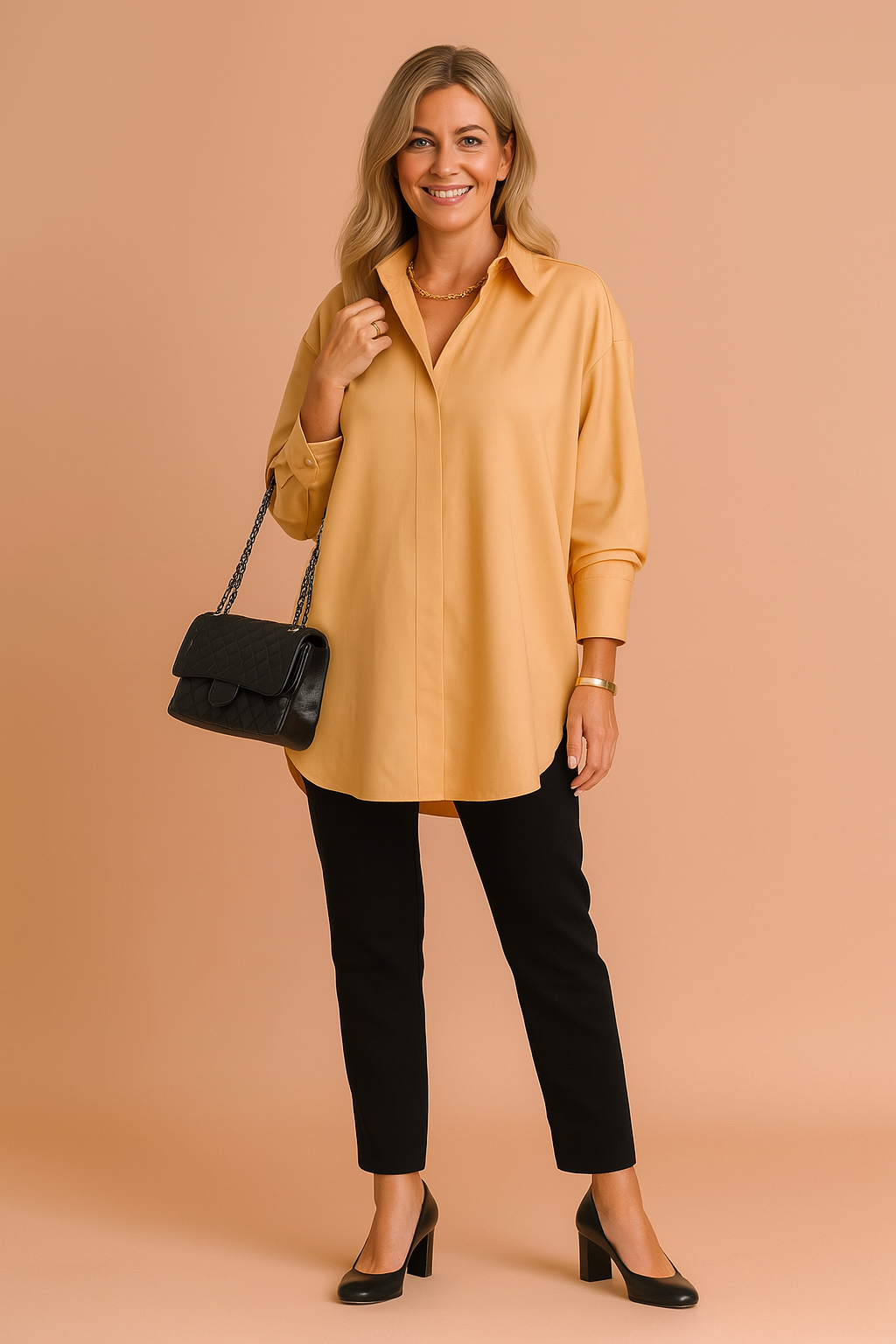 Stylish women's oversized blouse, a modern long-sleeve top. Offers elegant comfort for both casual and workwear fashion.