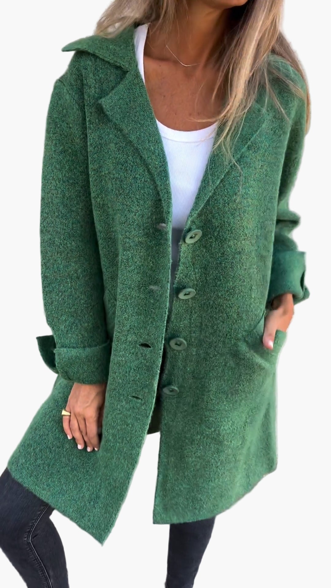 Close-up of the button-down detail on a women's cozy oversized trench coat, winter outerwear