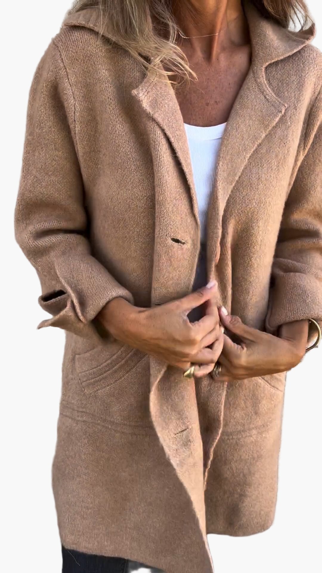 Stylish woman wearing a casual oversized trench coat with buttons, ideal for fall and winter
