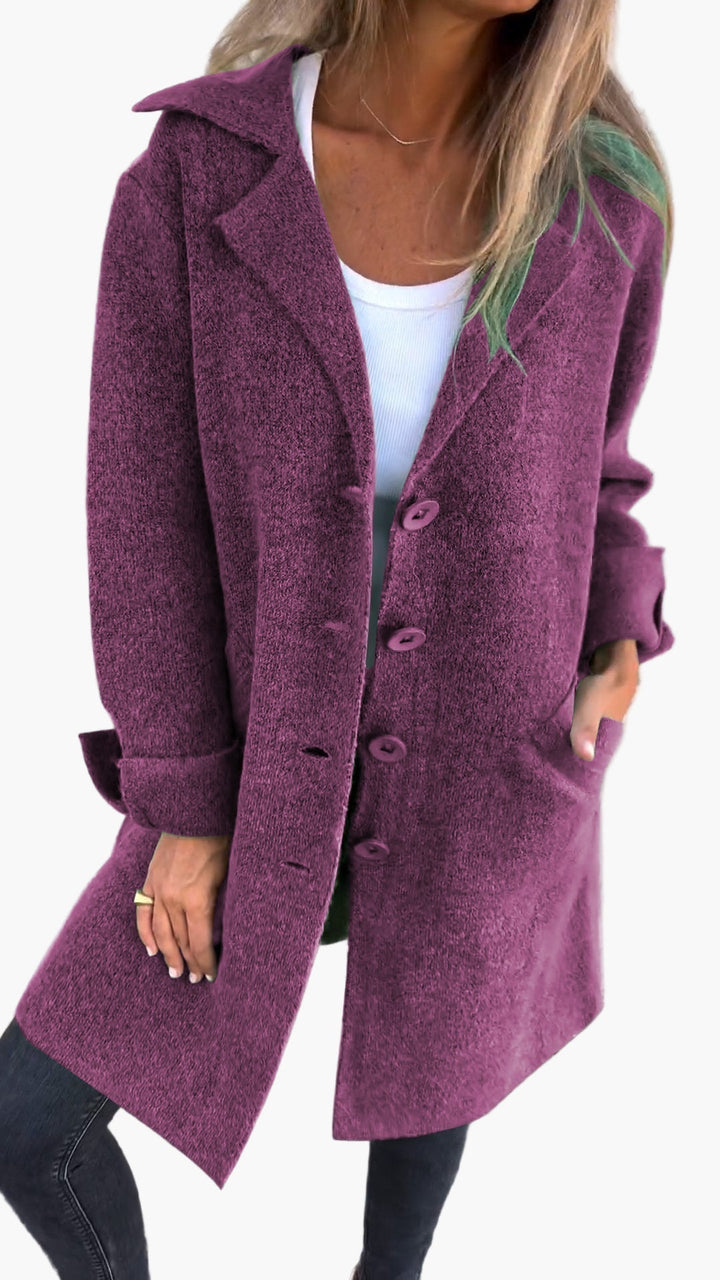 Fashionable women's oversized button-down trench coat featured from the back, elegant outerwear