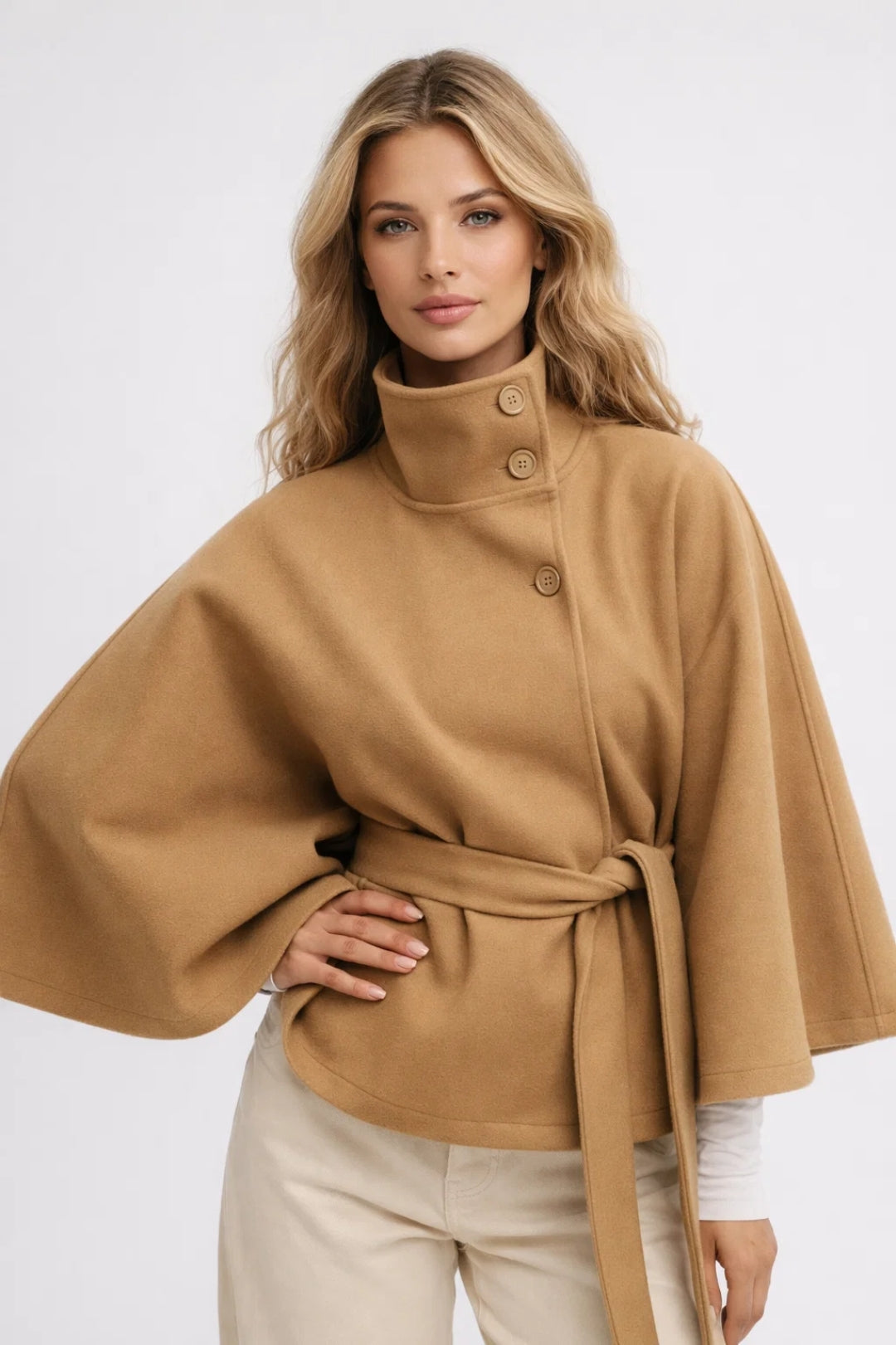 Elegant women's oversized short coat with a chic high collar and stylish belt for a modern, transitional look.