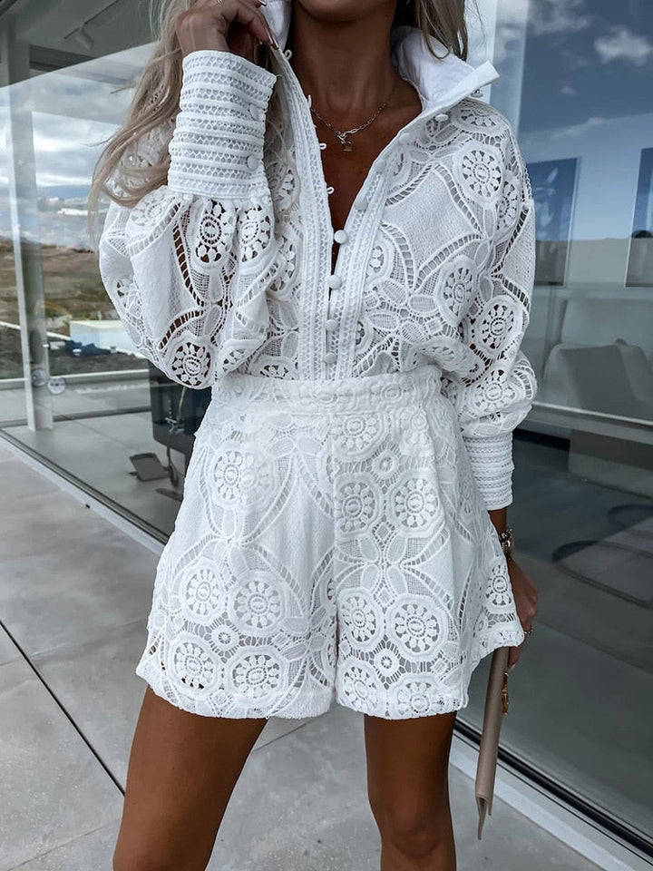Elegant women's patterned blouse & high-waist shorts 2-piece set. Perfect summer holiday co-ord.