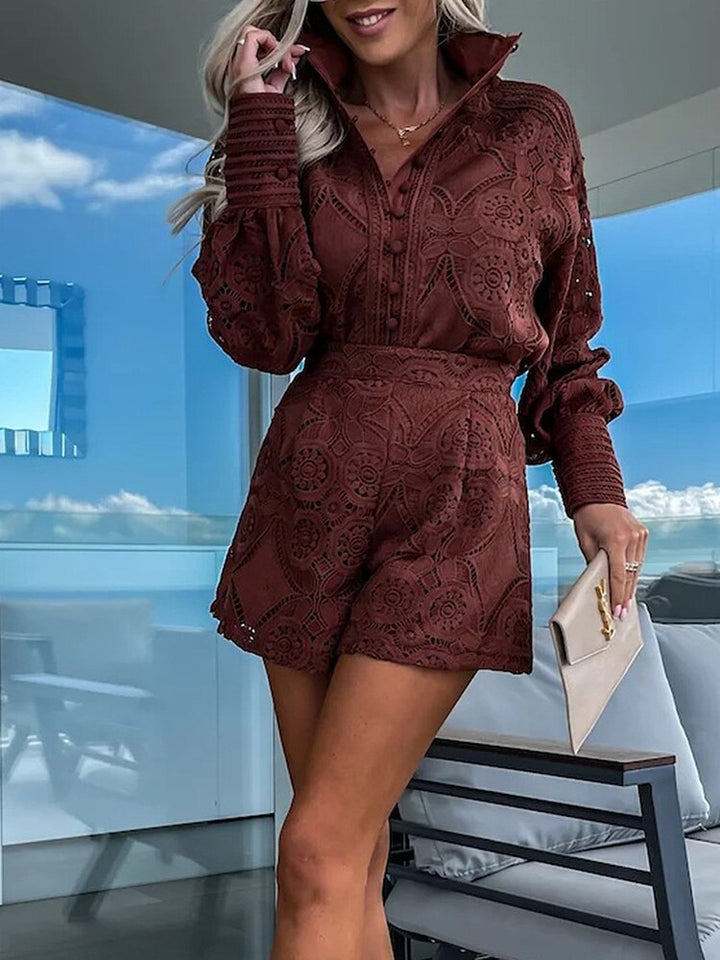 Women's chic patterned blouse & high-waist shorts set, ideal for holiday and resort wear.