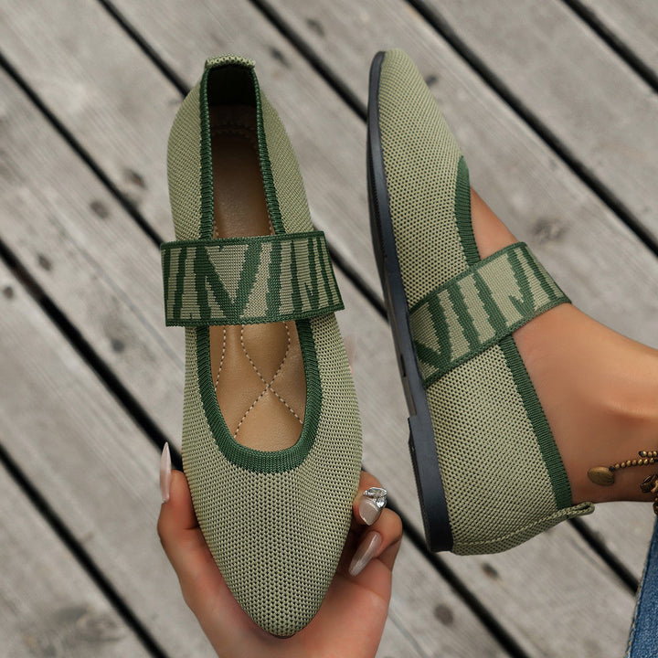 Women's ballet flats with unique patterned strap and pointed toe
