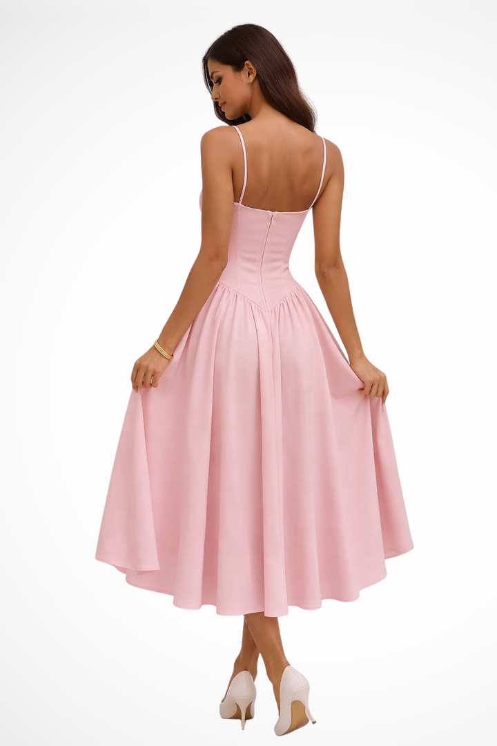 Pink women's strappy corset A-line midi dress with flared skirt. Ideal elegant occasion wear, perfect for party guests.