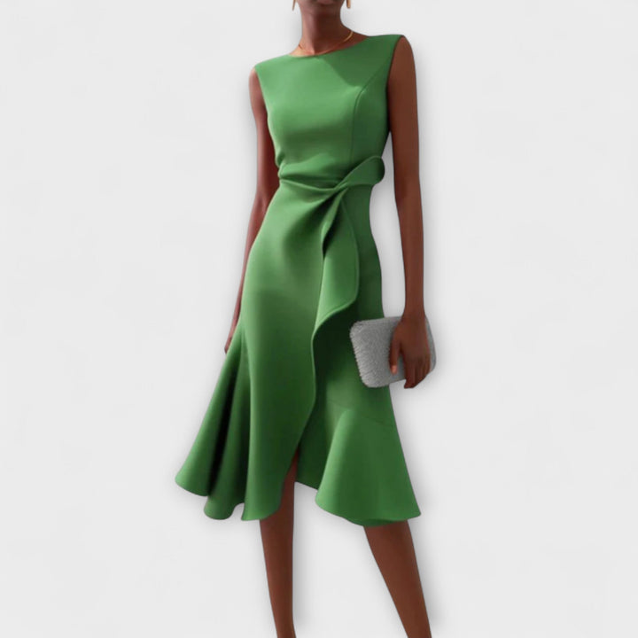 Chic women's midi dress with pleats and an asymmetrical design, perfect as a versatile party or casual dress