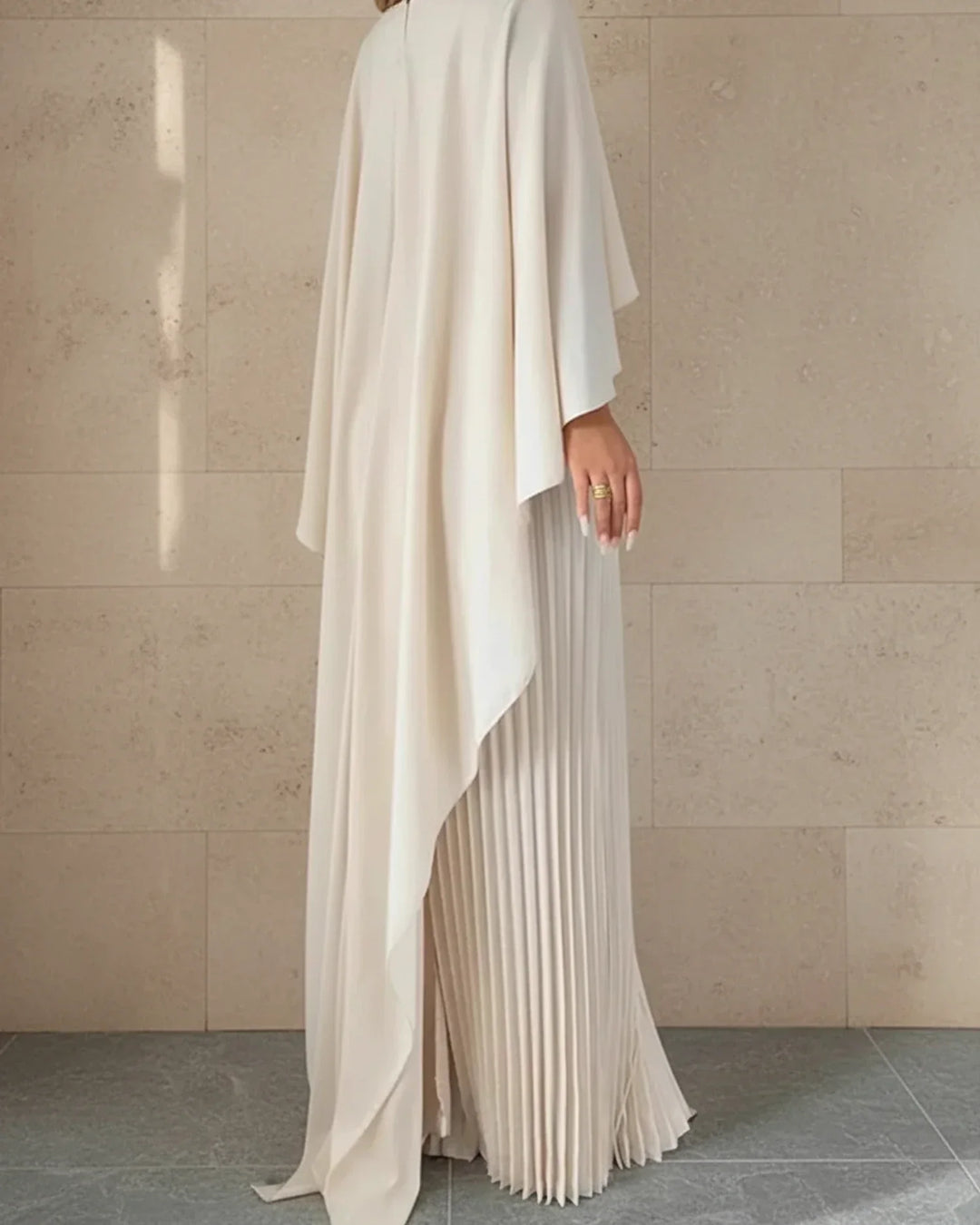 Stunning red pleated cape maxi dress for women, an elegant choice for wedding guests, formal or evening wear.