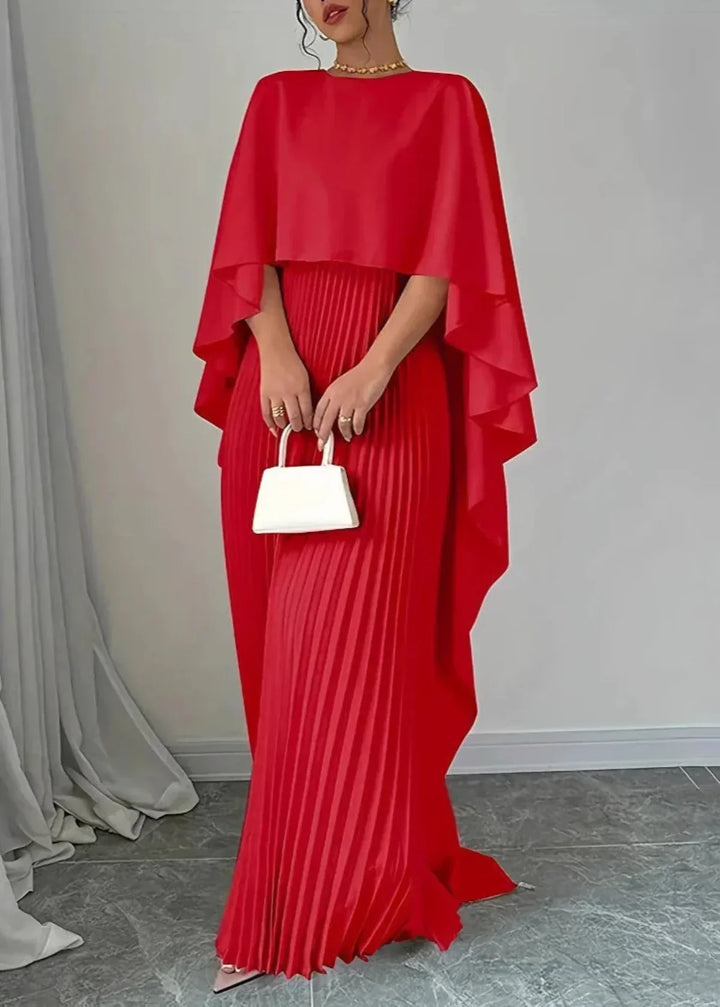 Beautiful women's pleated cape maxi dress for wedding guest attire, a fashionable and comfortable evening gown.