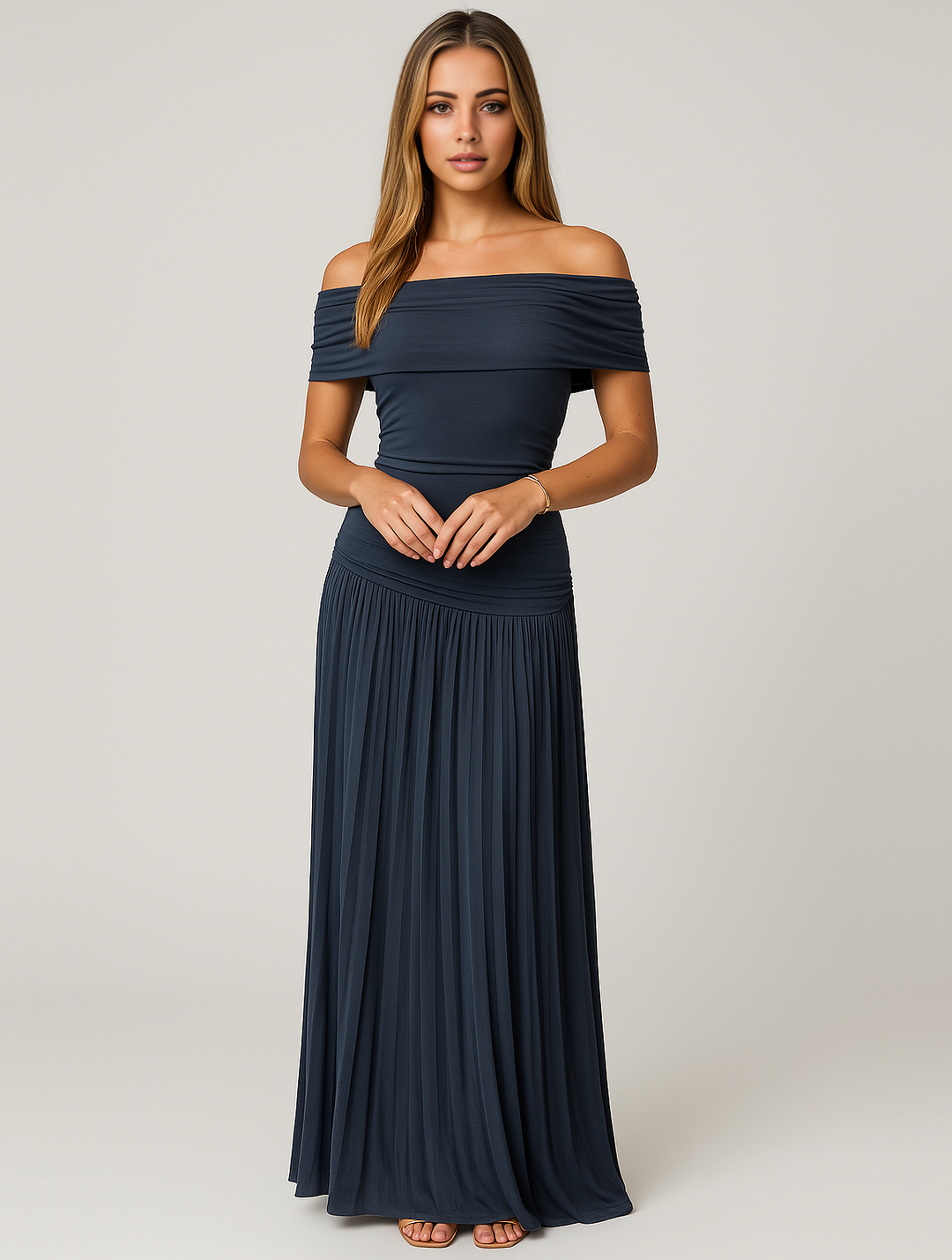 Sophisticated women's pleated maxi evening dress, offering a timeless look for formal gatherings.