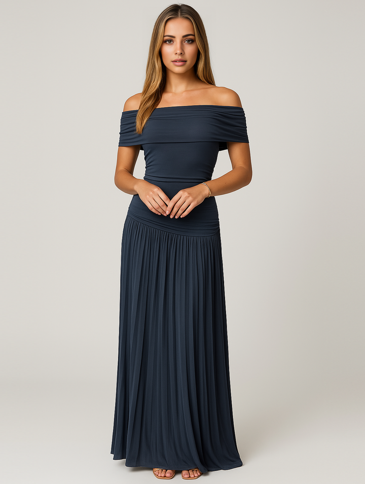 Sophisticated women's pleated maxi evening dress, offering a timeless look for formal gatherings.