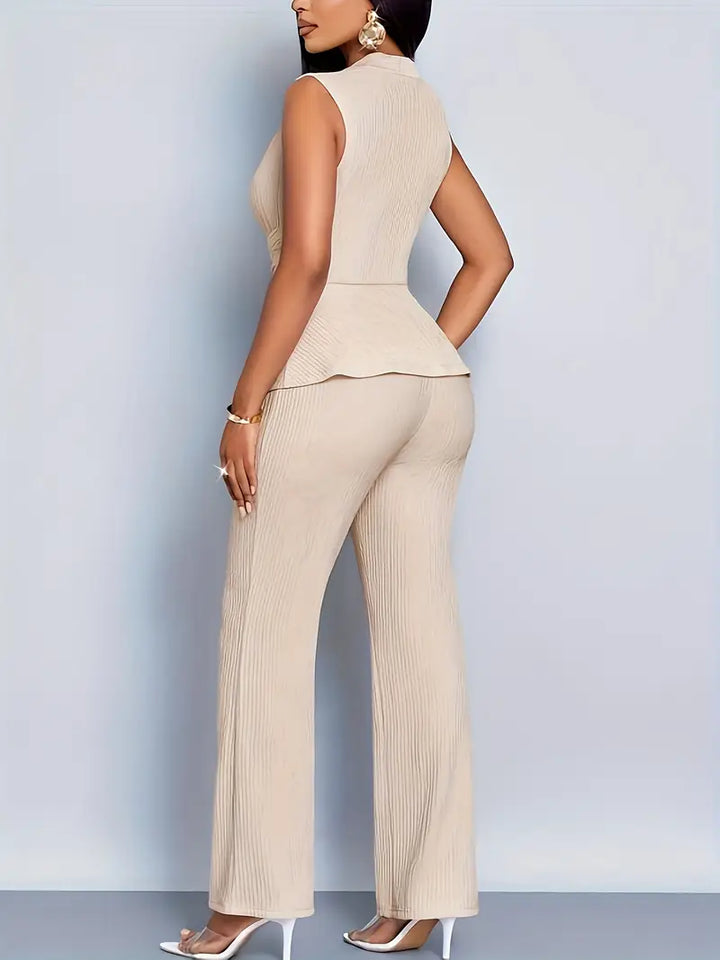 Sophisticated women's two-piece pleated peplum top and wide-leg pant set for elegant wear.