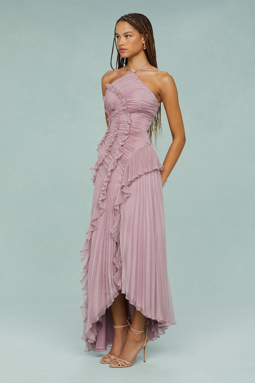 Full shot of a women's pleated ruffle halter midi dress, showcasing its flowy silhouette.