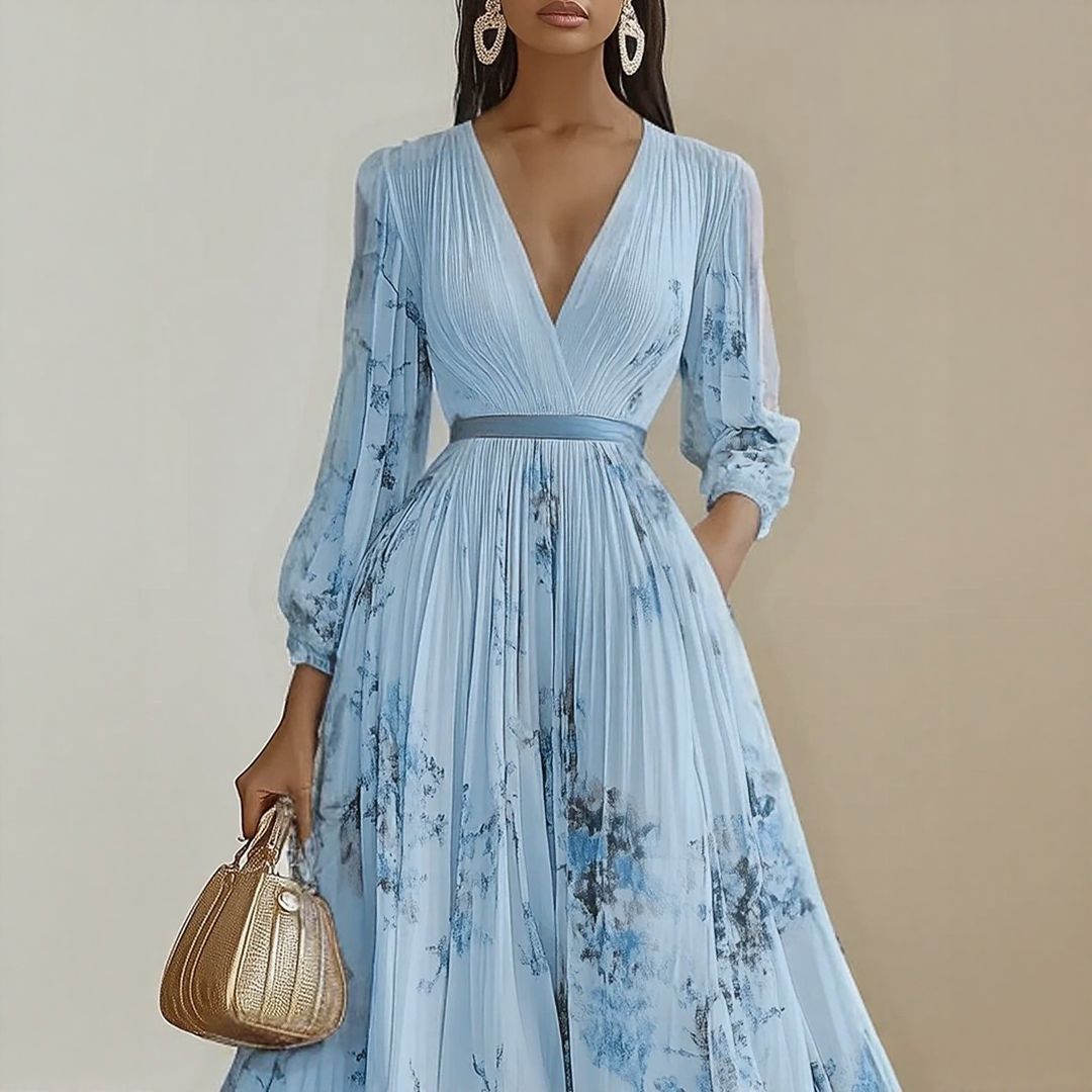 Chic and flowing women's maxi dress with V-neck, floral print, pleated skirt, and long sleeves