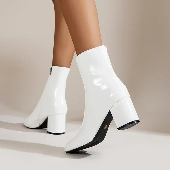 Chic women's pointed toe ankle boots, ideal for elegant fall fashion & casual winter outfits.