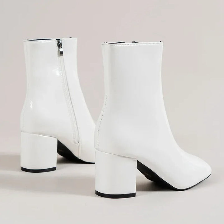 Versatile women's pointed toe ankle boots with block heel, suitable for elegant & casual chic looks.