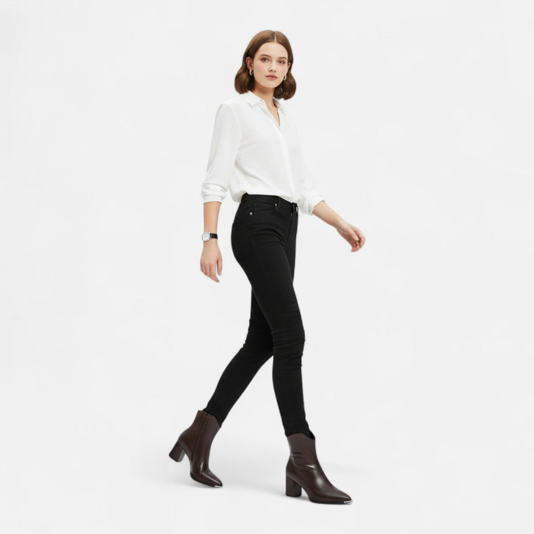 Comfortable women's slip-on pointed-toe Chelsea boots. Versatile ankle footwear for elegant everyday wear.