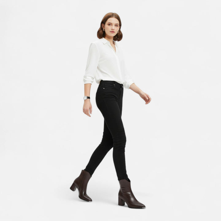 Comfortable women's slip-on pointed-toe Chelsea boots. Versatile ankle footwear for elegant everyday wear.