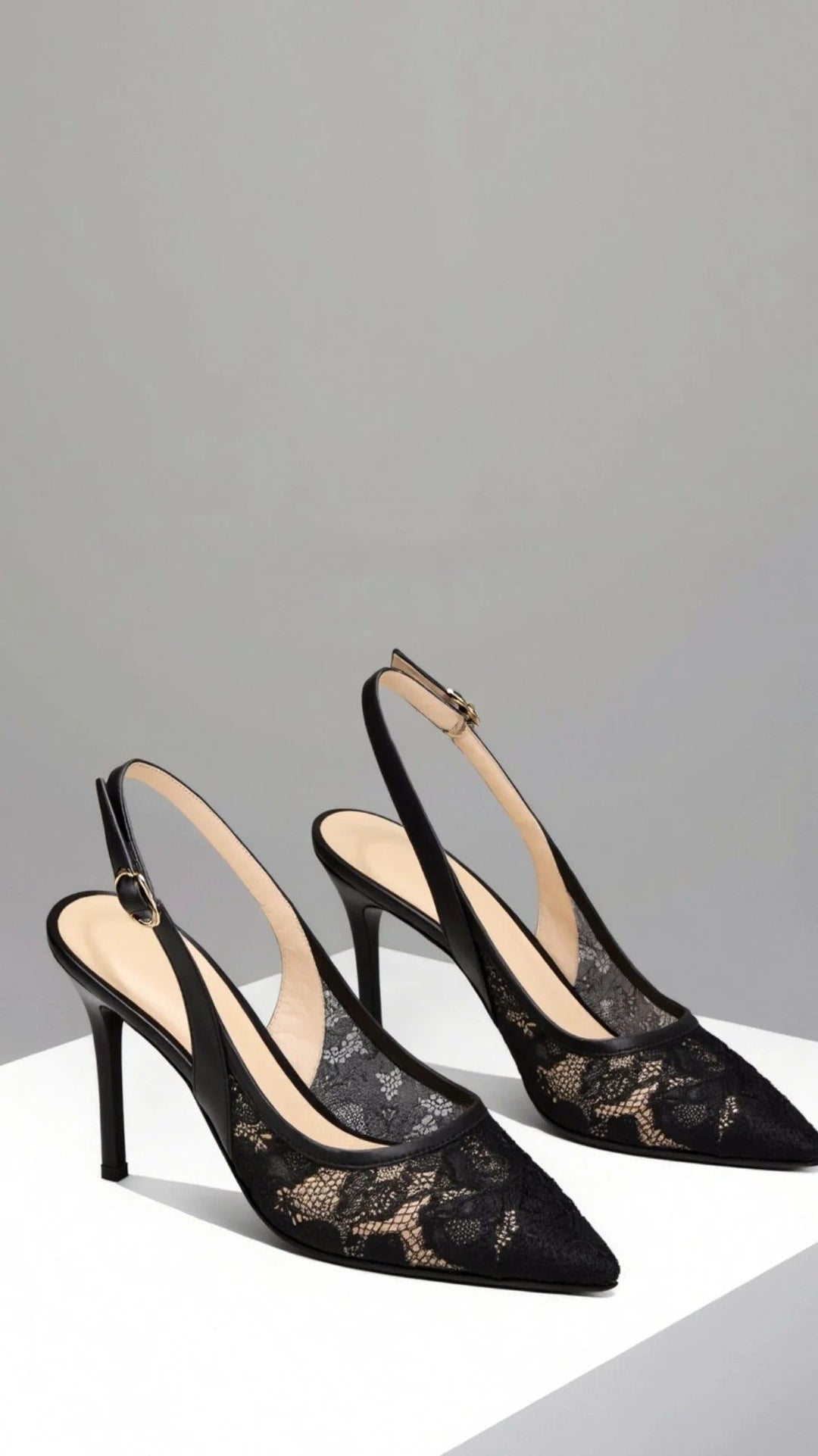 Women's classic pointed-toe slingback heels, offering timeless elegance for dress and evening wear.