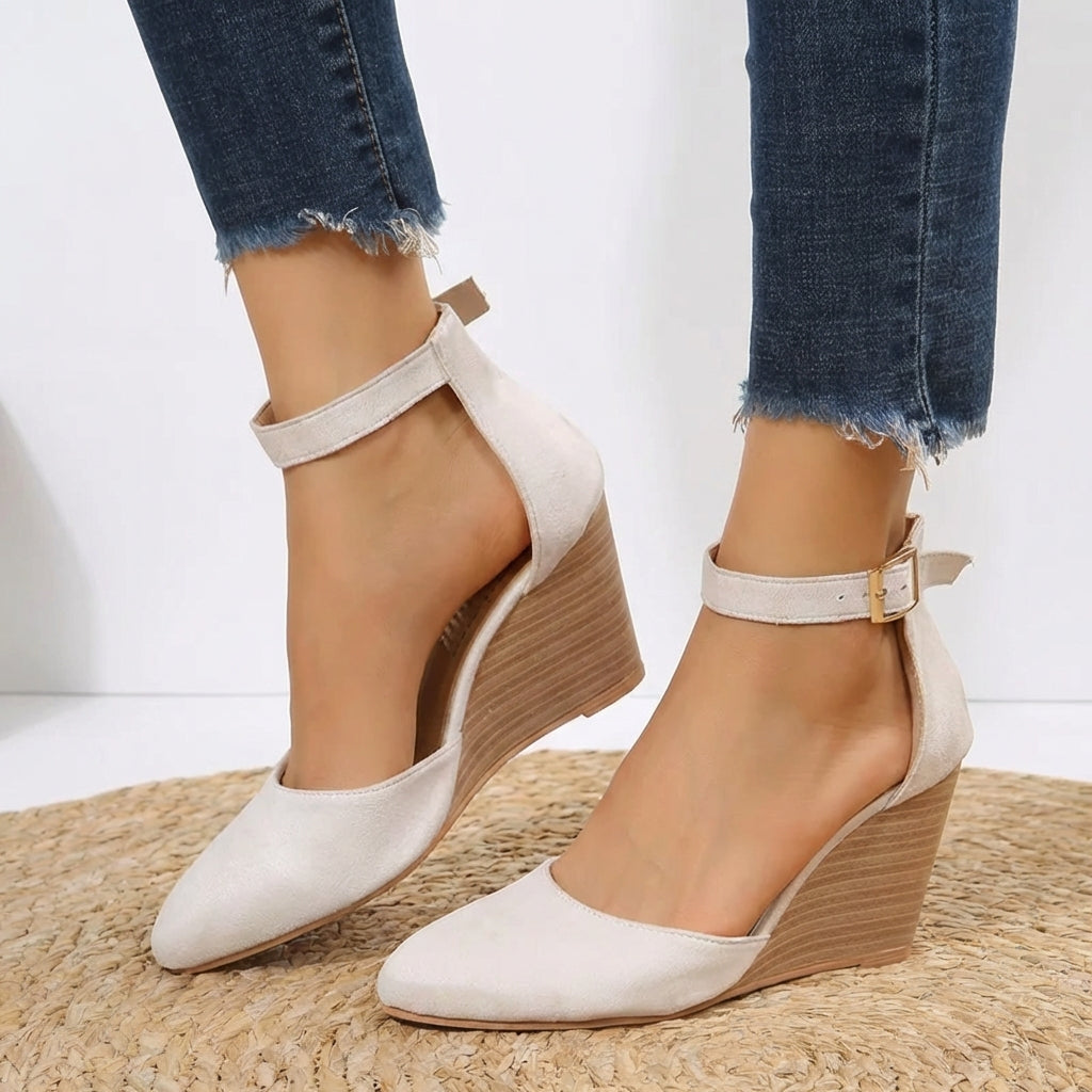 Chic women's pointed toe wedge heels with an adjustable ankle strap. Versatile for elegant events or daily wear.