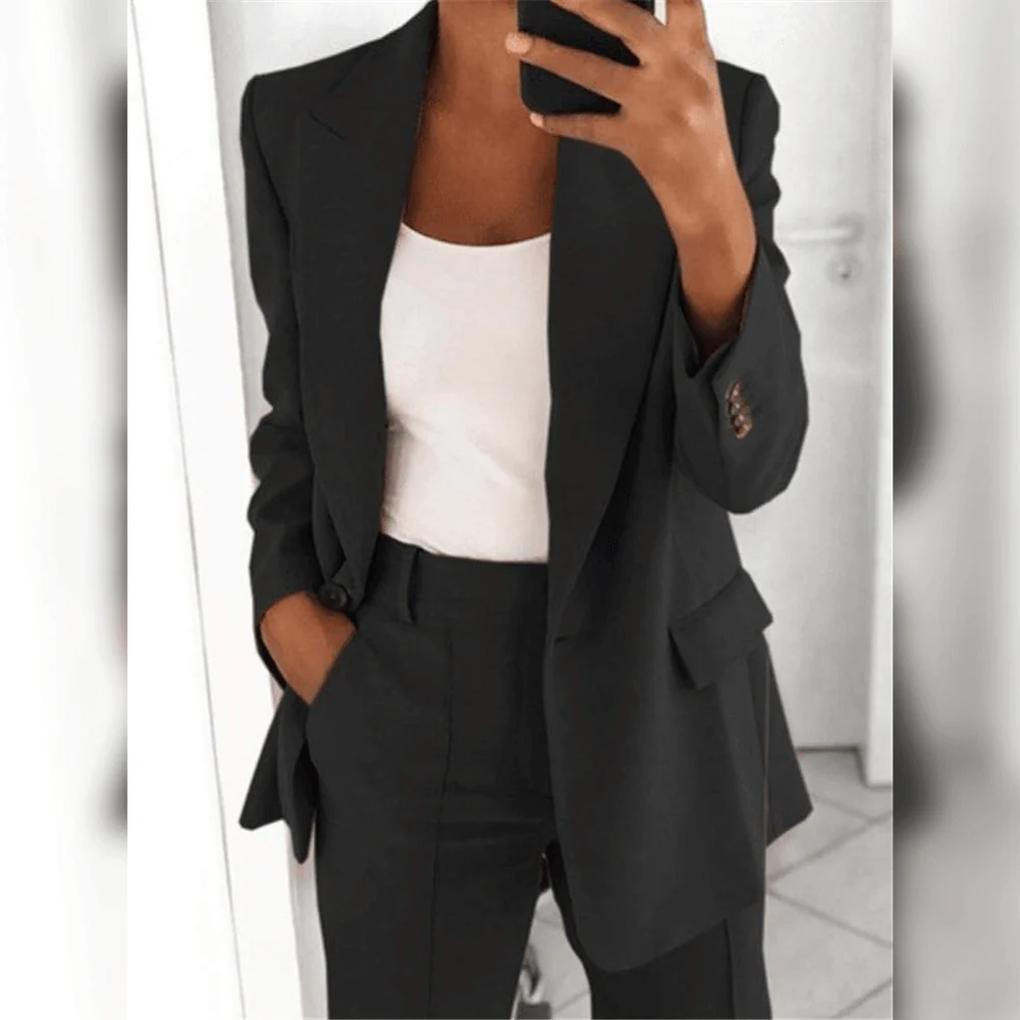 Elegant women's professional black blazer and pant suit set for business attire, ideal for office wear.