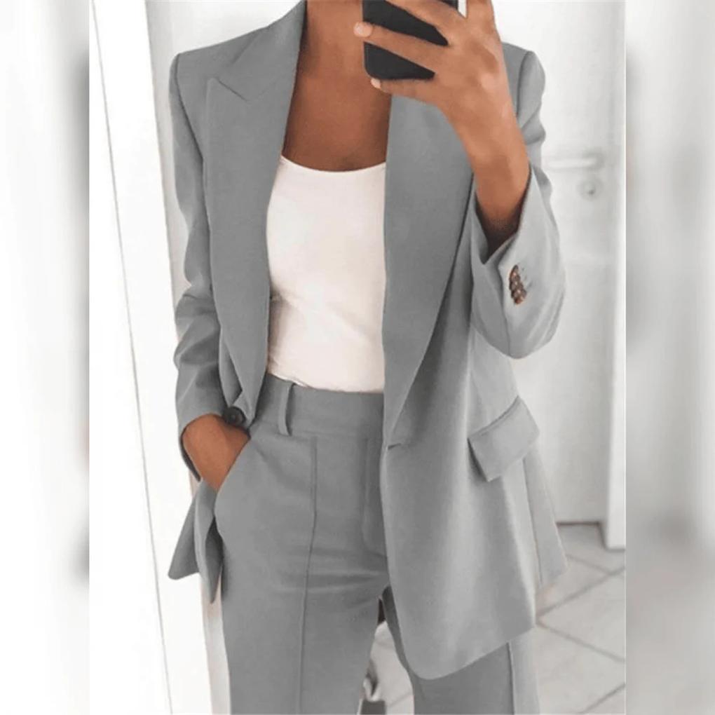 Women's formal wear blazer and pant suit set in a classic color, showcasing professional and elegant style.
