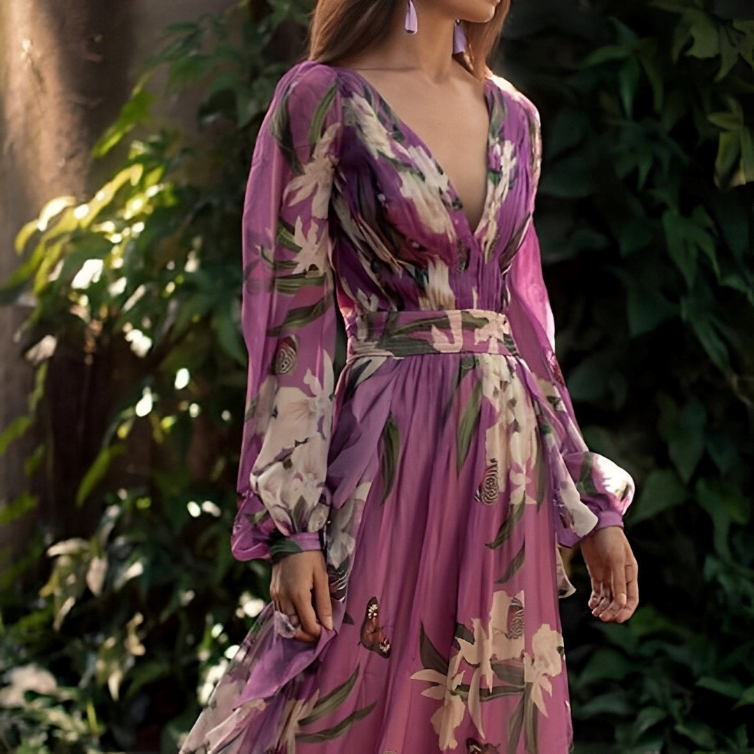 Stylish women's summer maxi dress with purple floral pattern and flattering V-neck.