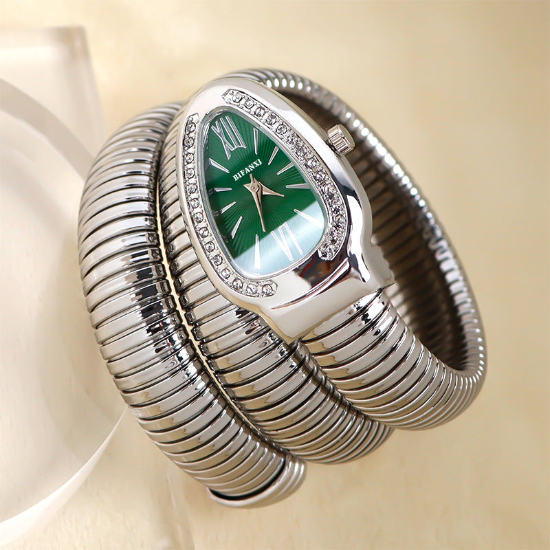 Elegant women's quartz timepiece with a beautiful snake design & stylish bracelet.