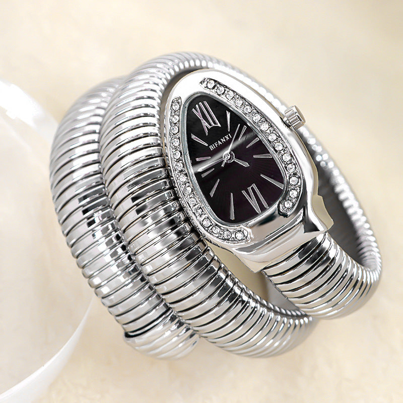 Unique women's snake-inspired quartz watch, an elegant fashion bracelet included.