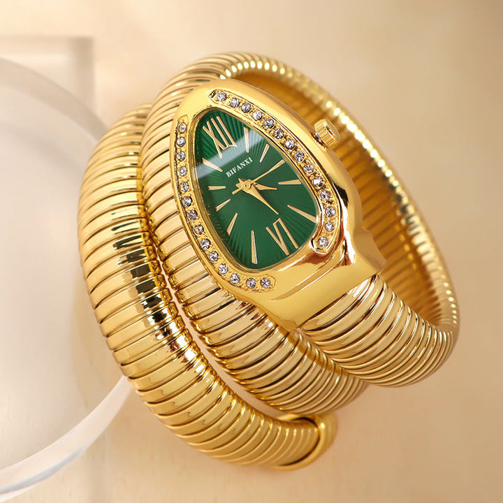 Gorgeous women's quartz watch, elegant snake design, with a chic bracelet accessory.