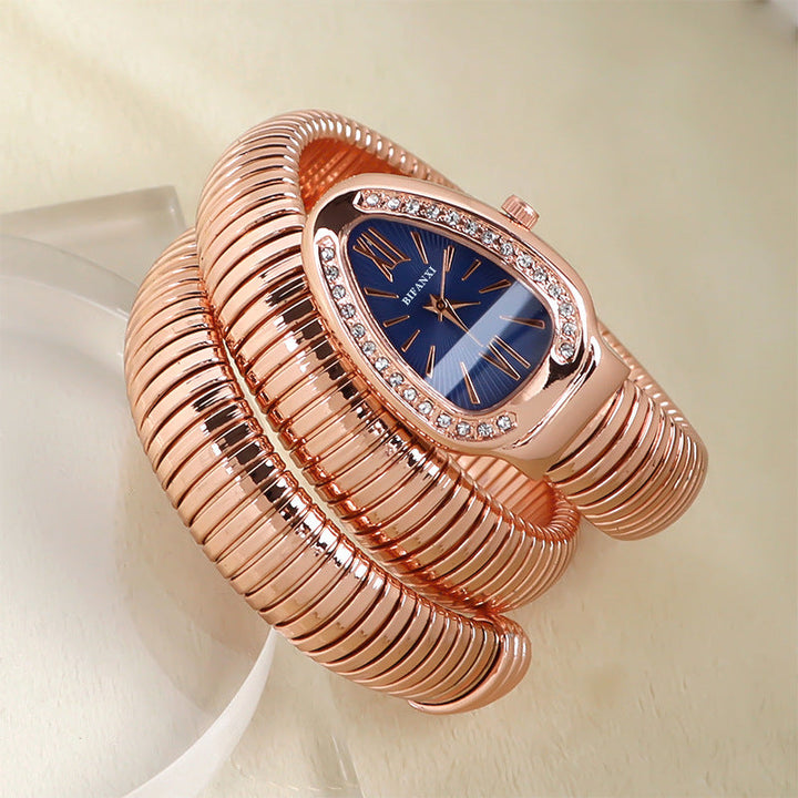 Beautiful women's snake quartz watch, a chic accessory with an elegant bracelet.