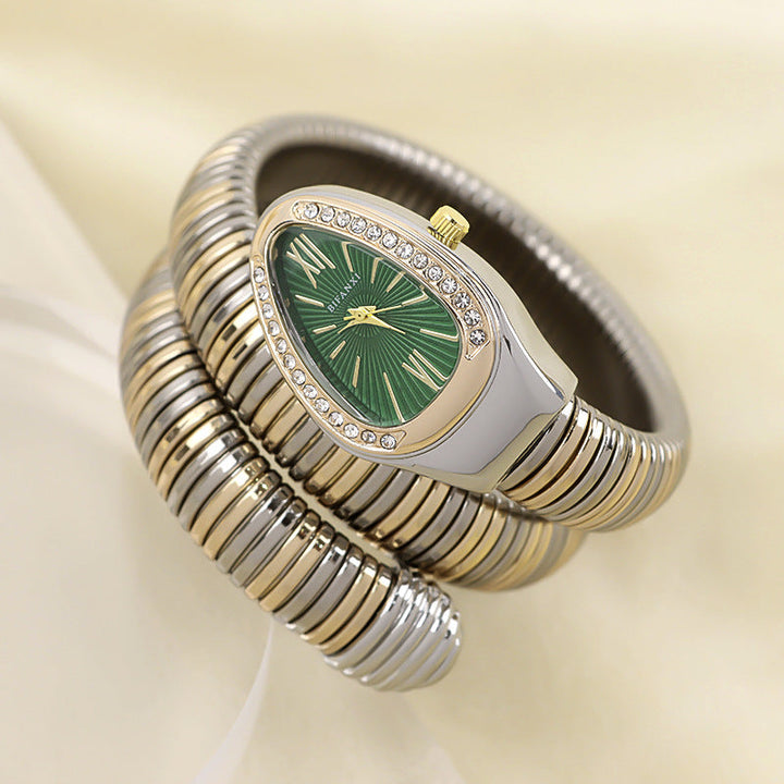 Women's gold-tone snake watch, quartz movement, and chic bracelet for accessories.