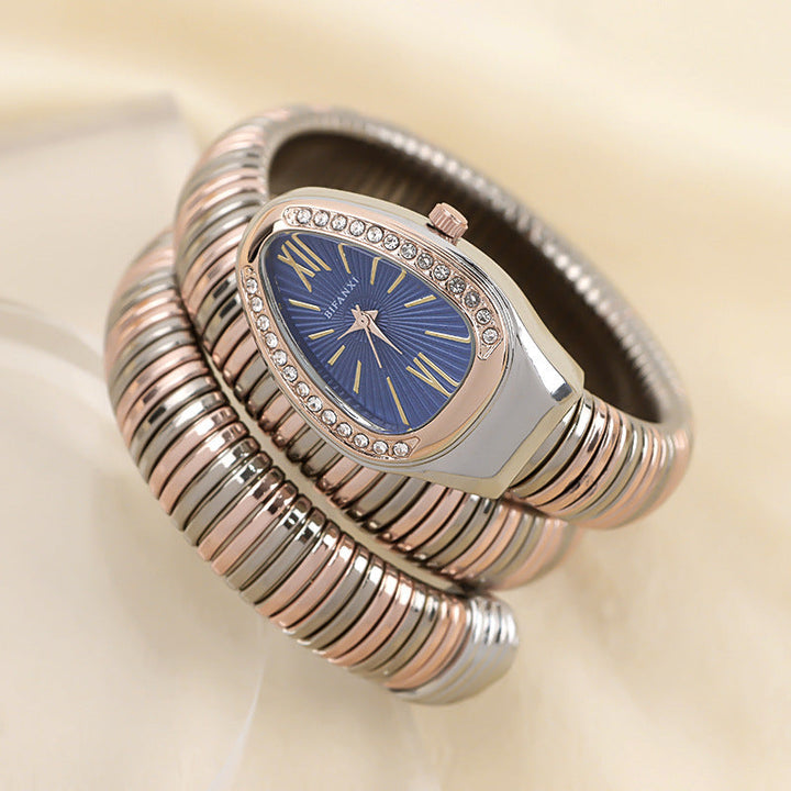Chic women's snake quartz watch, a sophisticated fashion accessory with a bracelet.
