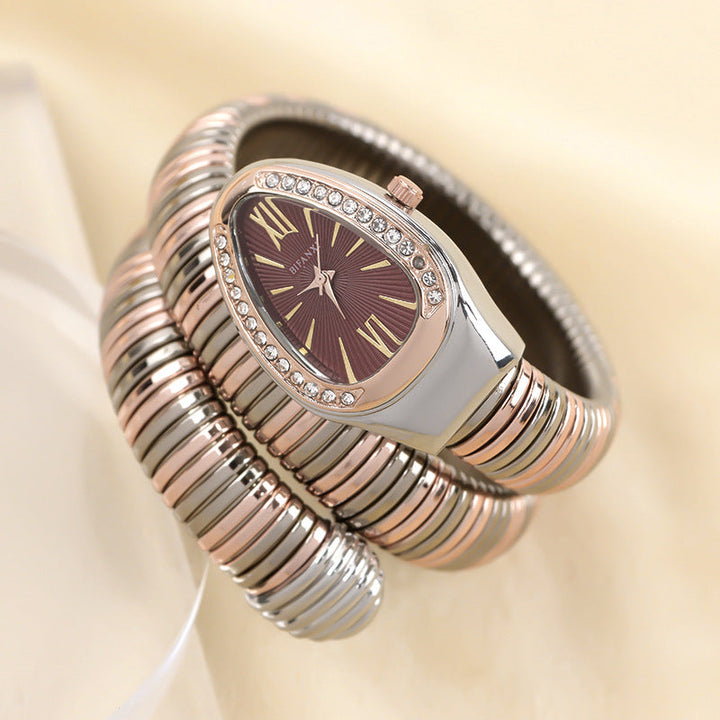 Delicate women's snake quartz watch with an elegant bracelet, perfect jewelry.