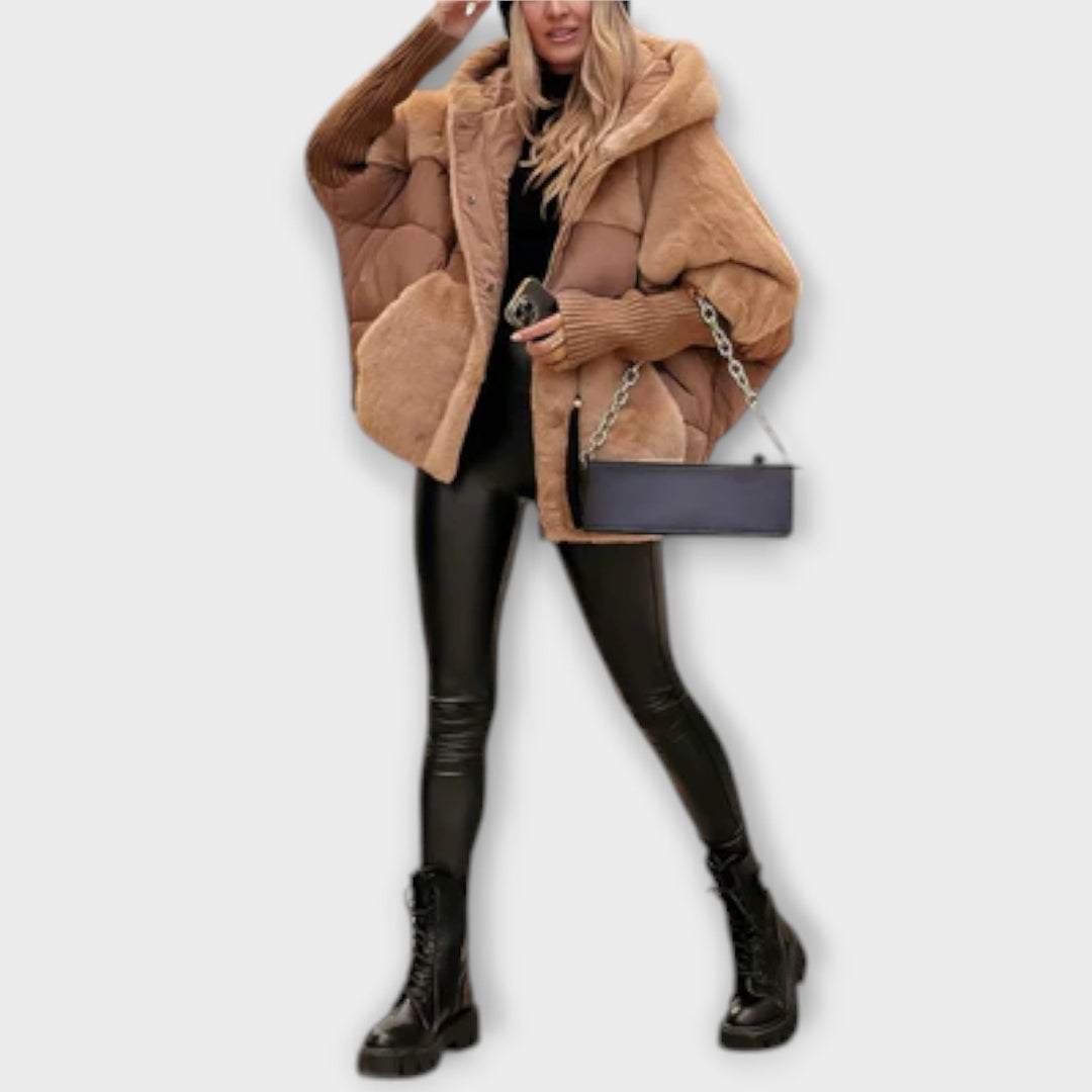 Fashionable women's quilted puffer jacket, featuring a cozy teddy lining for casual winter wear.